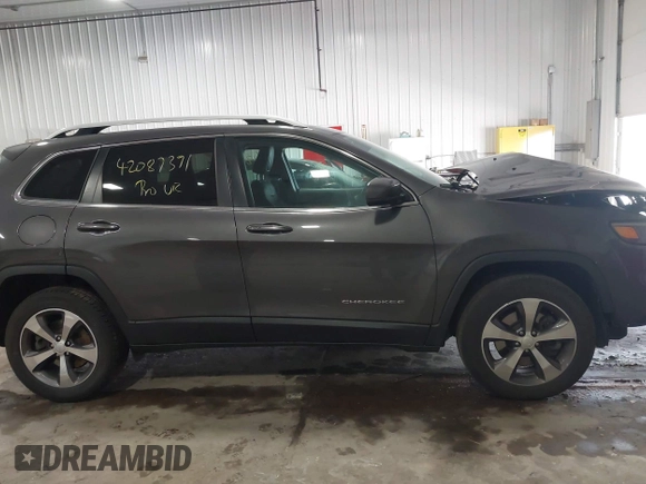 2019 Jeep Cherokee Limited with VIN 1C4PJMDX2KD467412, listed as a IAAI auction lot 42087391 with 106,168 mi miles and . Bid and sale history available at DreamBid. Image 13.