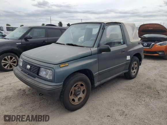 1994 Geo Tracker z VIN 2CNBE18U1R6918878, wystawiony jako Copart lot #75894834 z przebiegiem Nie podano mil oraz Nie do naprawy. Historia ofert i sprzedaży dostępna na DreamBid. Obrazek 1.