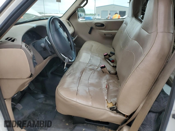 1999 Ford F-150 with VIN 1FTZX1728XNA67734, listed as a Copart auction lot 61195845 with Not provided miles and Salvage title. Bid and sale history available at DreamBid. Image 7.