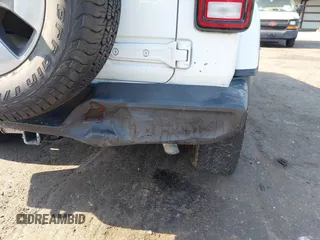 2018 Jeep Wrangler Unlimited Sahara z VIN 1C4HJXEG3JW175226, wystawiony jako IAAI lot #42307456 z przebiegiem 72 875 mil mil oraz . Historia ofert i sprzedaży dostępna na DreamBid. Obrazek 6.