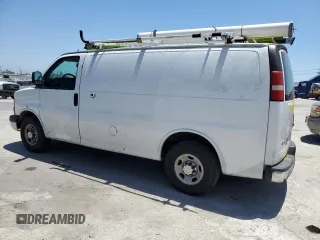 2014 Chevrolet Express Cargo Van with VIN 1GCWGFCB2E1122236, listed as a Copart auction lot 72826254 with 70,696 mi miles and Clean Title. Bid and sale history available at carsss.com. Image 2.