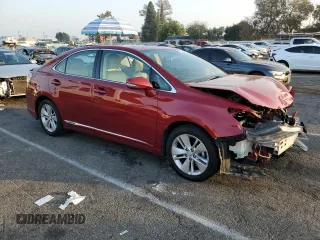 2010 Lexus HS 250h with VIN JTHBB1BA3A2024716, listed as a Copart auction lot 83153184 with 101,598 mi miles and Salvage Title. Bid and sale history available at DreamBid. Image 4.