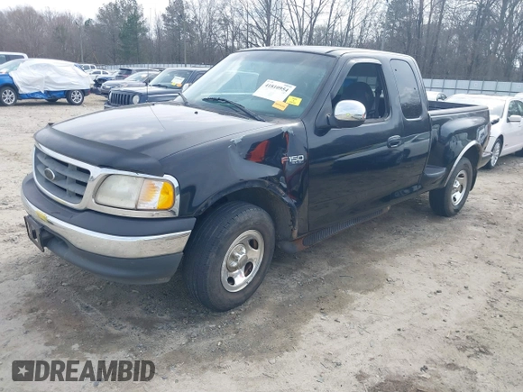 2000 Ford F-150 XL with VIN 1FTZX0725YKA09559, listed as a IAAI auction lot 41810954 with Not provided miles and . Bid and sale history available at DreamBid. Image 2.