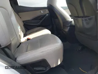 2017 Hyundai Santa Fe 2.4L z VIN 5XYZU3LB7HG438756, wystawiony jako IAAI lot #41480791 z przebiegiem 138 392 mil mil oraz . Historia ofert i sprzedaży dostępna na DreamBid. Obrazek 8.
