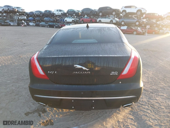 2018 Jaguar XJ with VIN SAJWJ2GD3J8W15092, listed as a IAAI auction lot 41844106 with 56,357 mi miles. Bid and sale history available at carsss.com. Image 16.