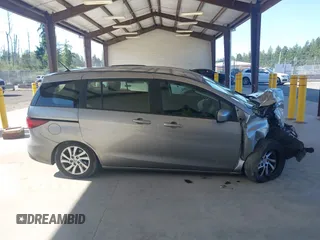 2012 Mazda 5 Sport with VIN JM1CW2BL3C0142202, listed as a IAAI auction lot 42397815 with Not provided miles and . Bid and sale history available at DreamBid. Image 14.