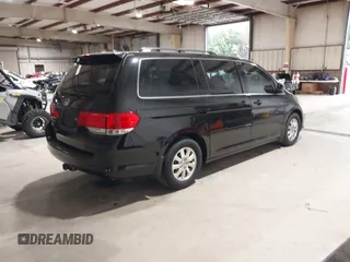 2010 Honda Odyssey EX-L with VIN 5FNRL3H64AB102171, listed as a IAAI auction lot 41966366 with 151,118 mi miles. Bid and sale history available at carsss.com. Image 4.