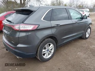 2016 Ford Edge SEL z VIN 2FMPK3J8XGBC40773, wystawiony jako IAAI lot #42129409 z przebiegiem 169 836 mil mil oraz . Historia ofert i sprzedaży dostępna na DreamBid. Obrazek 4.