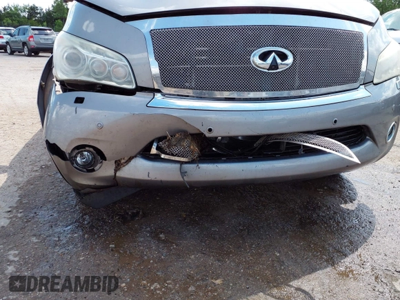 2013 Infiniti QX56 with VIN JN8AZ2NEXD9060450, listed as a IAAI auction lot 42388986 with 124,129 mi miles and . Bid and sale history available at DreamBid. Image 6.