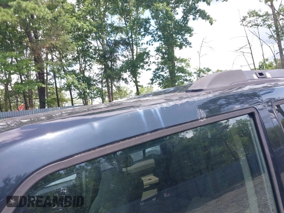 2006 Jeep Commander with VIN 1J8HG48K56C324296, listed as a IAAI auction lot 42735532 with 143,009 mi miles and . Bid and sale history available at DreamBid. Image 13.