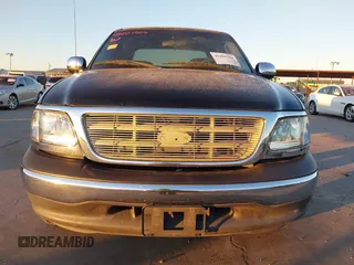 2002 Ford F-150 XLT with VIN 1FTRW07622KD31203, listed as a IAAI auction lot 41401506 with 166,949 mi miles. Bid and sale history available at carsss.com. Image 12.
