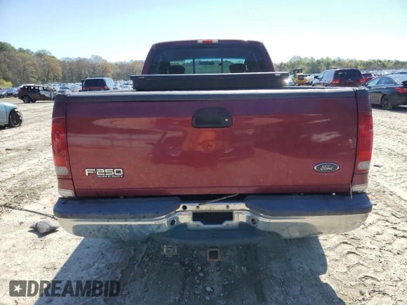2004 Ford F-250 XL with VIN 1FTNX21P54EC66020, listed as a Copart auction lot 52016515 with 337,412 mi miles and Salvage title. Bid and sale history available at DreamBid. Image 6.