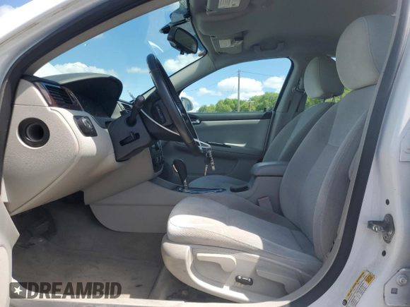 2012 Chevrolet Impala LS Fleet with VIN 2G1WF5E33C1121499, listed as a Copart auction lot 58003935 with 218,039 mi miles and Salvage title. Bid and sale history available at DreamBid. Image 7.