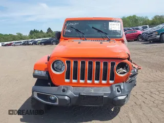 2019 Jeep Wrangler Unlimited Sahara with VIN 1C4HJXEGXKW579982, listed as a IAAI auction lot 42167111 with 98,243 mi miles and . Bid and sale history available at DreamBid. Image 13.