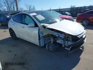 2023 Tesla Model Y Long Range z VIN 7SAYGAEE5PF768791, wystawiony jako IAAI lot #41697741 z przebiegiem 15 757 mil mil oraz . Historia ofert i sprzedaży dostępna na DreamBid. Obrazek 1.