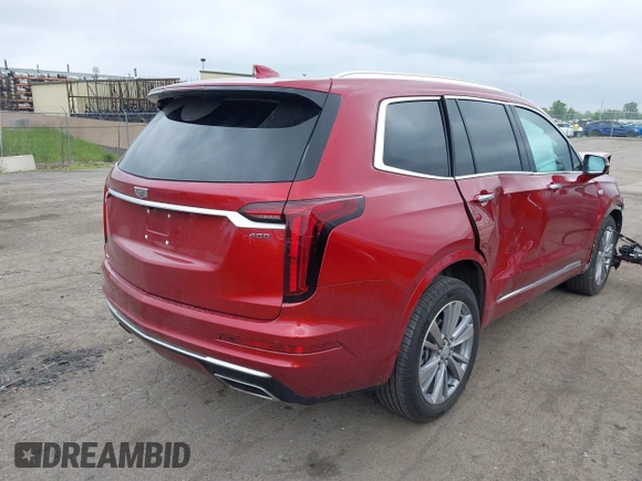 2024 Cadillac XT6 AWD Premium Luxury with VIN 1GYKPDRSXRZ724989, listed as a IAAI auction lot 42378559 with 22,520 mi miles and . Bid and sale history available at DreamBid. Image 4.