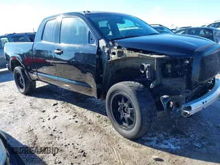 2012 Toyota Tundra 4WD Truck with VIN 5TFUW5F14CX217964, listed as a IAAI auction lot 41265024 with 144,426 mi miles. Bid and sale history available at carsss.com. Image 1.