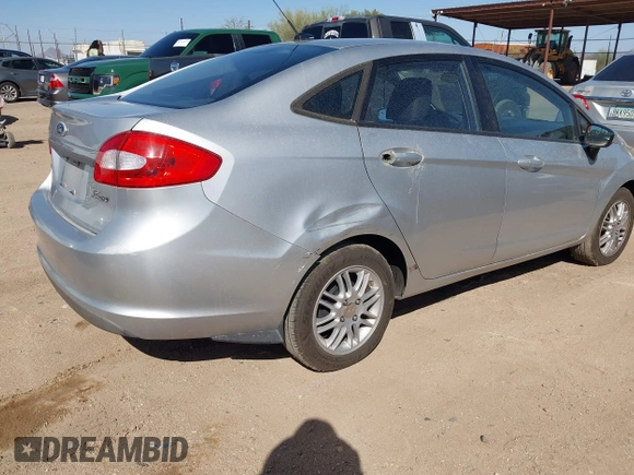 2011 Ford Fiesta SE with VIN 3FADP4BJ4BM177814, listed as a IAAI auction lot 41694964 with 180,565 mi miles. Bid and sale history available at carsss.com. Image 4.