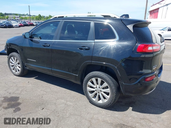 2017 Jeep Cherokee Overland z VIN 1C4PJMJS1HW530604, wystawiony jako IAAI lot #41701168 z przebiegiem 112 945 mil mil oraz . Historia ofert i sprzedaży dostępna na DreamBid. Obrazek 3.