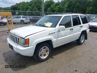1996 Jeep Grand Cherokee Limited z VIN 1J4GZ78YXTC191527, wystawiony jako IAAI lot #42352616 z przebiegiem 325 927 mil mil oraz . Historia ofert i sprzedaży dostępna na DreamBid. Obrazek 2.