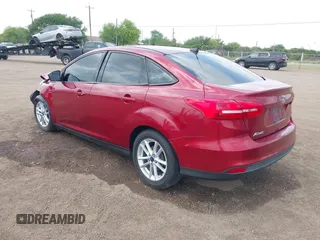 2015 Ford Focus SE with VIN 1FADP3F24FL323536, listed as a IAAI auction lot 41876148 with 221,050 mi miles. Bid and sale history available at carsss.com. Image 3.