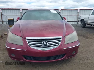 2006 Acura RL z VIN JH4KB16566C005642, wystawiony jako IAAI lot #42613927 z przebiegiem 201 601 mil mil oraz . Historia ofert i sprzedaży dostępna na DreamBid. Obrazek 6.