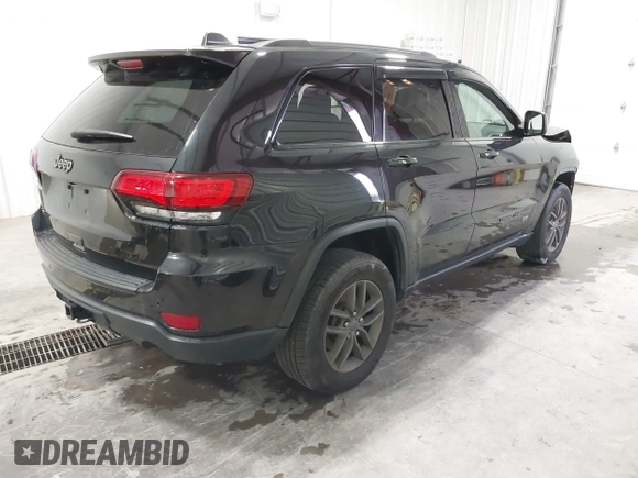 2016 Jeep Grand Cherokee 75th Anniversary z VIN 1C4RJFAG8GC476475, wystawiony jako IAAI lot #41509557 z przebiegiem 94 621 mil mil oraz . Historia ofert i sprzedaży dostępna na DreamBid. Obrazek 4.