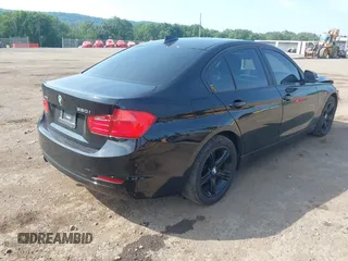 2013 BMW 3 Series 320i xDrive with VIN WBA3C3C50DF981864, listed as a IAAI auction lot 42599429 with 155,150 mi miles and . Bid and sale history available at DreamBid. Image 4.