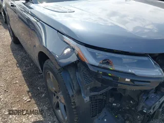 2025 Land Rover Range Rover Velar Dynamic SE with VIN SALYL2EX9SA809479, listed as a IAAI auction lot 42150495 with 7,038 mi miles and . Bid and sale history available at DreamBid. Image 1.