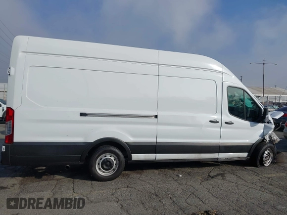 2021 Ford Transit Cargo z VIN 1FTBR3X82MKA18067, wystawiony jako IAAI lot #41205233 z przebiegiem 48 391 mil mil oraz . Historia ofert i sprzedaży dostępna na DreamBid. Obrazek 14.
