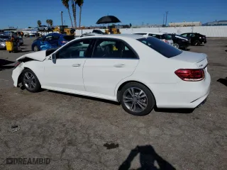 2016 Mercedes-Benz E-Class E 250 BlueTEC Luxury with VIN WDDHF9HB3GB233290, listed as a Copart auction lot 38986183 with 94,617 mi miles. Bid and sale history available at carsss.com. Image 2.