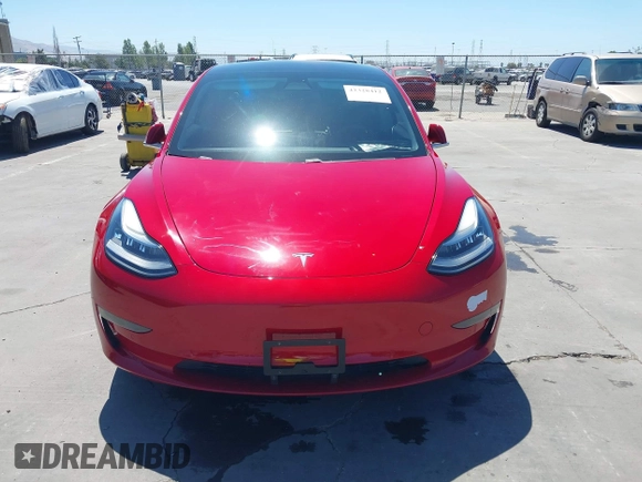 2018 Tesla Model 3 Long Range Battery z VIN 5YJ3E1EAXJF048839, wystawiony jako IAAI lot #42328412 z przebiegiem 83 083 mil mil oraz . Historia ofert i sprzedaży dostępna na DreamBid. Obrazek 12.