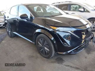 2023 Nissan ARIYA Venture+ z VIN JN1BF0AA7PM411481, wystawiony jako IAAI lot #42339196 z przebiegiem 26 046 mil mil oraz . Historia ofert i sprzedaży dostępna na DreamBid. Obrazek 1.