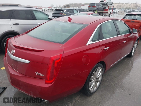 2013 Cadillac XTS Luxury with VIN 2G61P5S32D9115640, listed as a IAAI auction lot 41065284 with 125,643 mi miles and . Bid and sale history available at carsss.com. Image 4.