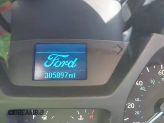 2015 Ford Transit Cargo with VIN 1FTNE1YGXFKA66907, listed as a IAAI auction lot 41605119 with 305,897 mi miles and . Bid and sale history available at DreamBid. Image 7.
