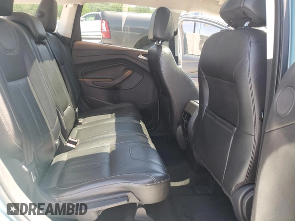 2013 Ford Escape Titanium с VIN 1FMCU0J98DUB77372, выставлен на аукционе Copart как лот 58006235 с пробегом 200 929 миль миль и Списание • Salvage title. История ставок и продаж доступна на DreamBid. Изображение 11.