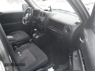 2013 Jeep Patriot Latitude with VIN 1C4NJPFB8DD129848, listed as a IAAI auction lot 40949386 with 168,839 mi miles and . Bid and sale history available at carsss.com. Image 5.