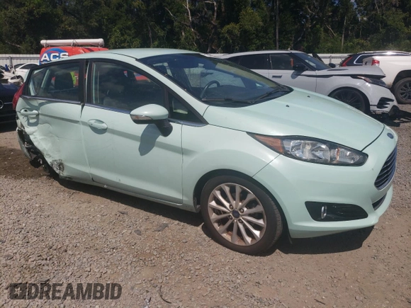2017 Ford Fiesta Titanium with VIN 3FADP4FJ1HM143817, listed as a Copart auction lot 72231594 with 88,453 mi miles and Salvage Title. Bid and sale history available at DreamBid. Image 4.