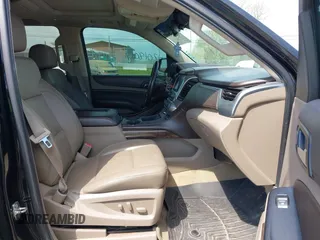 2015 Chevrolet Tahoe LT with VIN 1GNSCBKC9FR679748, listed as a IAAI auction lot 42018017 with 224,264 mi miles and . Bid and sale history available at DreamBid. Image 5.