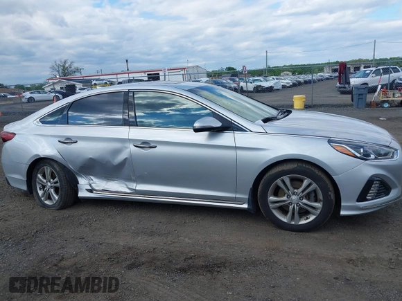 2019 Hyundai Sonata Sport z VIN 5NPE34AFXKH740037, wystawiony jako IAAI lot #42215038 z przebiegiem 79 714 mil mil oraz . Historia ofert i sprzedaży dostępna na DreamBid. Obrazek 13.