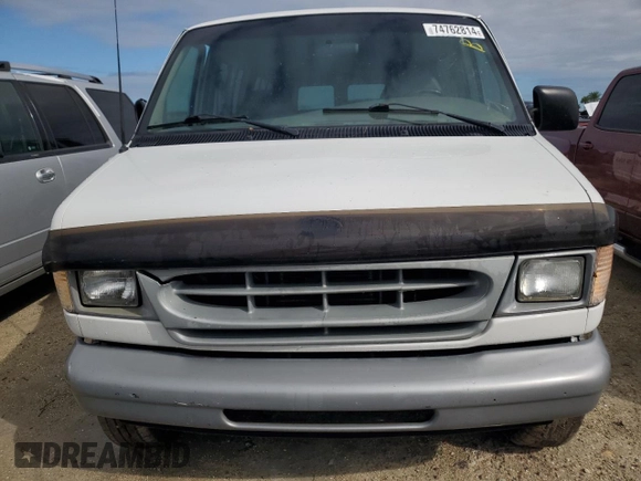 2000 Ford Econoline Passenger XL with VIN 1FBSS31L1YHB80264, listed as a Copart auction lot 74762814 with 61,702 mi miles and Salvage Title. Bid and sale history available at DreamBid. Image 5.