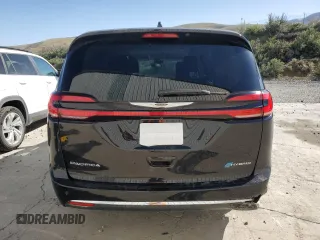 2024 Chrysler Pacifica Hybrid Select z VIN 2C4RC1S70RR134623, wystawiony jako Copart lot #54058655 z przebiegiem 32 076 mil mil oraz Tytuł czysty. Historia ofert i sprzedaży dostępna na DreamBid. Obrazek 6.