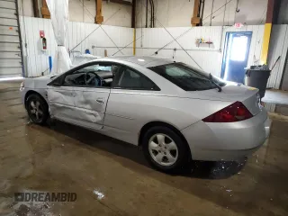 2001 Mercury Cougar z VIN 1ZWFT61LX15601779, wystawiony jako Copart lot #72073124 z przebiegiem 121 192 mil mil oraz Szkody całkowita. Historia ofert i sprzedaży dostępna na DreamBid. Obrazek 2.