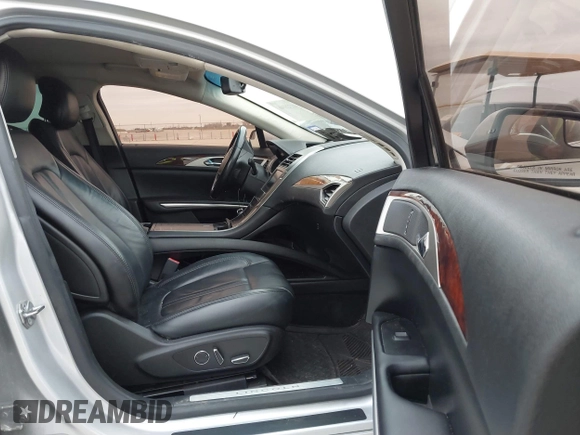 2015 Lincoln MKZ with VIN 3LN6L2J98FR618486, listed as a IAAI auction lot 41328946 with 167,211 mi miles and . Bid and sale history available at DreamBid. Image 5.