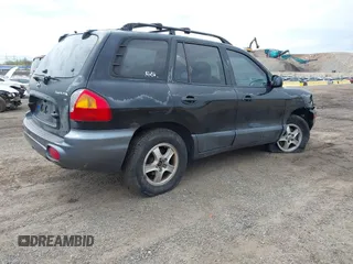 2004 Hyundai Santa Fe GLS with VIN KM8SC73D54U714336, listed as a IAAI auction lot 42079721 with 104,751 mi miles. Bid and sale history available at carsss.com. Image 4.