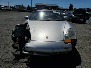 1998 Porsche Boxster z VIN WP0CA2986WU620657, wystawiony jako Copart lot #55595275 z przebiegiem 78 711 mil mil oraz Szkoda całkowita • Salvage title. Historia ofert i sprzedaży dostępna na DreamBid. Obrazek 5.