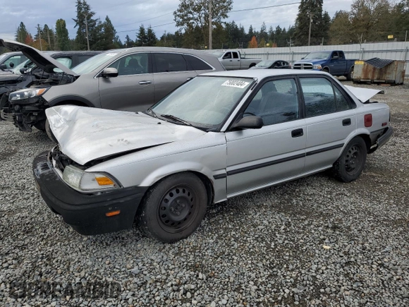1991 Toyota Corolla z VIN 1NXAE94A8MZ234510, wystawiony jako Copart lot #75002404 z przebiegiem 188 051 mil mil oraz Szkoda całkowita • Salvage title. Historia ofert i sprzedaży dostępna na DreamBid. Obrazek 1.