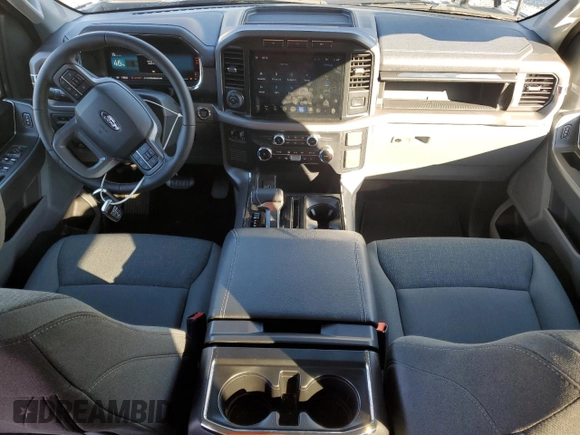 2024 Ford F-150 Lightning XLT with VIN 1FTVW3LK1RWG18473, listed as a Copart auction lot 86523084 with 6,824 mi miles and Salvage title. Bid and sale history available at DreamBid. Image 8.