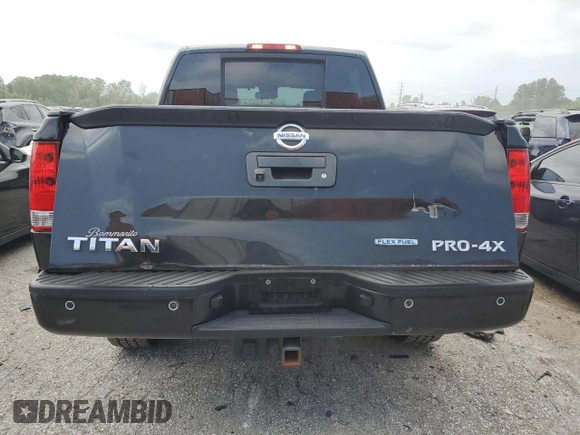 2015 Nissan Titan Pro-4X with VIN 1N6BA0EC1FN507894, listed as a Copart auction lot 65784274 with 147,576 mi miles and Salvage title. Bid and sale history available at DreamBid. Image 6.