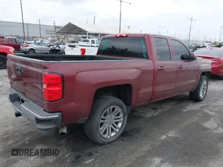 2015 Chevrolet Silverado 1500 LT with VIN 1GCRCRECXFZ238190, listed as a IAAI auction lot 42056318 with 102,040 mi miles. Bid and sale history available at carsss.com. Image 4.